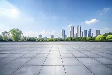 Modern cityscape with a wide open tiled plaza in the foreground, captured under a clear blue sky. The skyline features sleek high-rise buildings blending harmoniously with a row of vibrant green trees