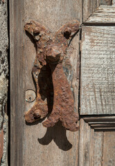 rust medieval door handle, middle ages, italy