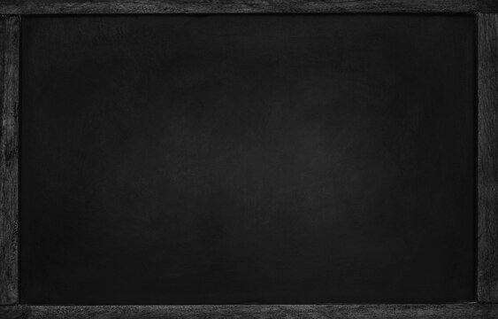 Empty black chalkboard with black wooden frame