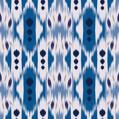 Ikat boho ethnic abstract ikat art.Aztec geometric art ornament print,folk embroidery, and Mexican style.Seamless pattern in tribalDesign for carpet, wallpaper, clothing, wrapping, fabric, cover.