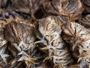A pile of dried fish is stacked on top of each other