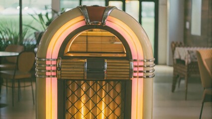 Retro jukebox in vintage diner with neon lights and nostalgic atmosphere