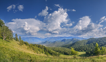 Mountain view, summer landscape, picturesque sky with clouds