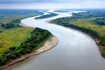 Majestic brahmaputra river meandering through assam valley in india