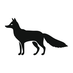 Black fox silhouette standing alert with bushy tail animal wildlife