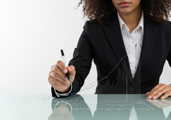 An elegant businesswoman meticulously analyzes a data graph on a modern translucent desk in a sleek, minimalist office.