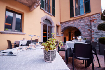 Outdoor Dining at Quaint European Restaurant with Rustic Architecture