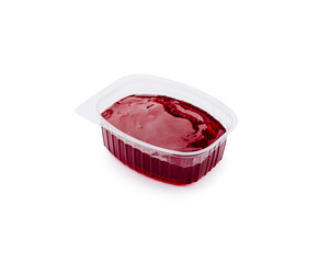 Delicious red jelly in a plastic container ready to serve at a gathering
