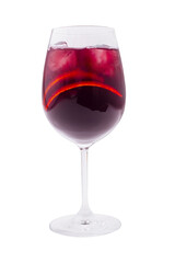 Elegant red drink in a crystal glass with ice cubes on display