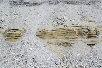 Sandstone is formed when sand grains are compacted over thousands to millions of years, with...