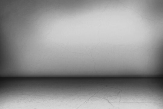 Flat design empty concrete room is showcasing grey surfaces with soft gradient lighting, copy space
