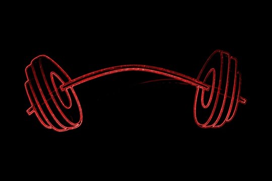 Fototapeta stylized red neon barbell is glowing on black backdrop in flat style with curved bar, plates