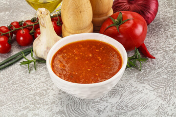 Hot tomato soup with diced chicken