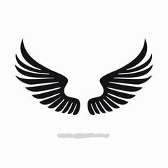 Fototapeta premium Black graceful wings span out, designed for logo concepts and creative design projects to add a touch of freedom.