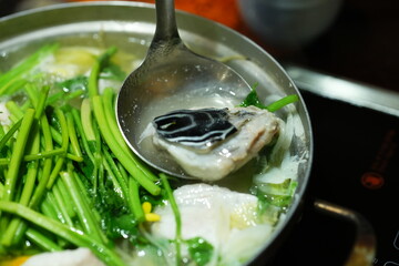Traditional Korean Puffer Fish Soup (Bokjiri) at Surim Bokguk Restaurant in Seoul