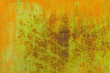 Weathered metal surface with rust and corrosion outdoors