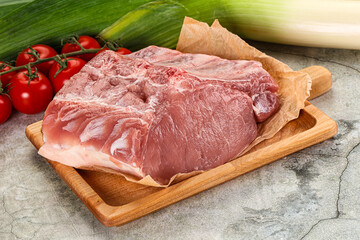 Raw pork loin cut with bone