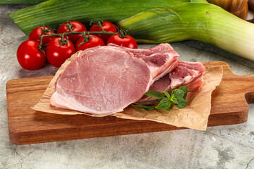 Raw pork steak loin with bone