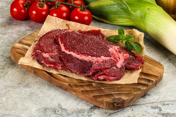 Raw beef cheeks cut for cooking