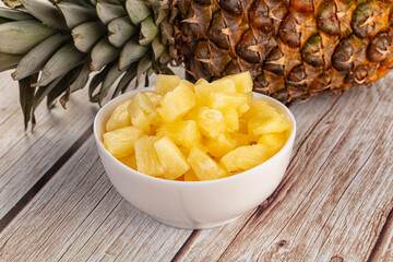 Sweet canned pineapple fruit pieces
