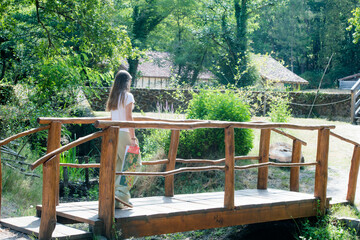 Young girl in a typical countryside landscape in southwest France.