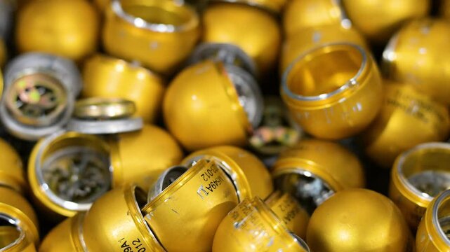 Modern warfare adaptation: Grenade casings are prepared with plastic for drone attachment at a Donetsk region, Ukraine, workshop in Ukraine.