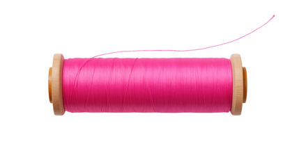 Close up shot of a spool of bright pink thread with some thread extending from the spool end