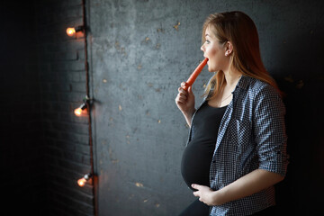 Pregnant young beautiful girl on the ninth month