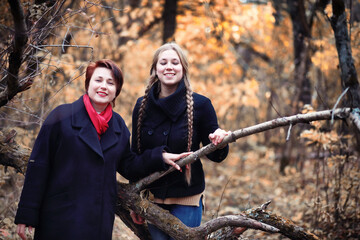 Young girl on a walk in the autumn