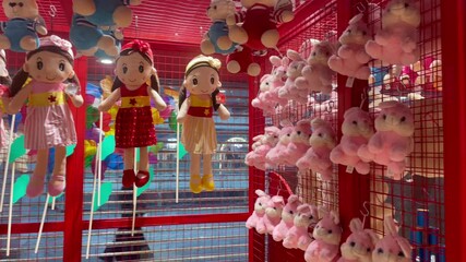 Colorful Carnival Toy Stall – Plush Dolls and Stuffed Animal Prizes Display