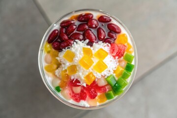 Vibrant Bowl with Tasty Toppings and Colorful Ingredients in an Overhead View