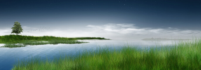 landscape with lake/A green meadow with trees and grass reflects on the calm lake and river water.