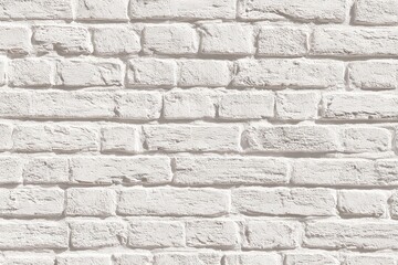 Fototapeta premium Whitewashed brick wall texture, showing subtle variations in tone and mortar lines, creating a clean, slightly aged aesthetic