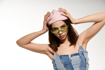 Vibrant young woman showcases unique fashion in vibrant attire and stylish accessories
