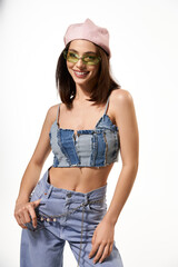 Stylish woman exuding confidence in vibrant attire at a contemporary urban setting