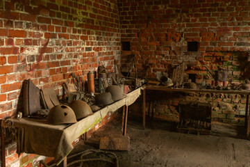 Military exhibits from World War II in a ruined fort
