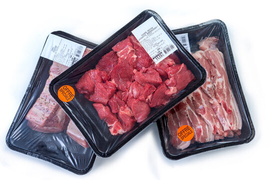Fresh meat packs displayed for purchase at market