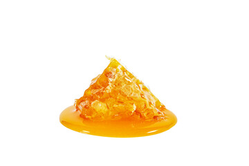 Honeycombs with flowing honey isolated on white background.