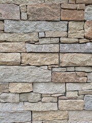 Fondo de pared con piedras rugosas de color gris. Textura de adoquines de granito 