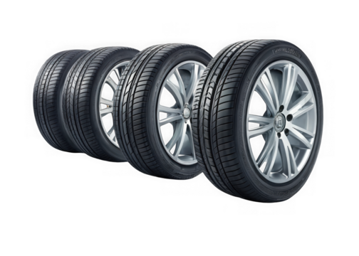 Set of four car tires with silver alloy wheels isolated on transparent background. Row of new car tires with silver rims ready for installation or sale