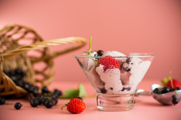 Refreshing berry ice cream on pink background