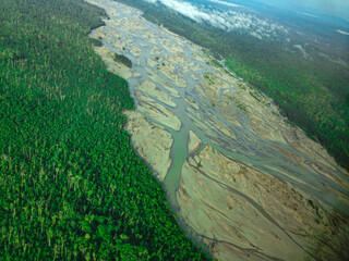 Aerial View of Meandering River and Dense Tropical Rainforest