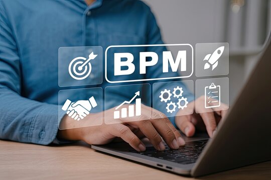 Business process management concept with icons representing goals teamwork growth efficiency and task completion as a person uses a laptop