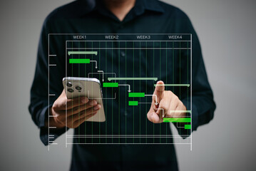 Hands typing on laptop with a digital Gantt chart overlay. Ideal for project planning, scheduling, productivity, workflow,