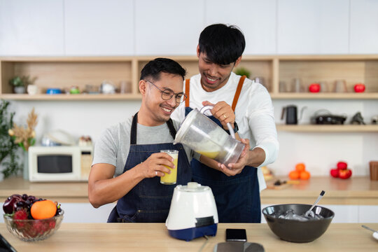 Healthy Cooking: Friends Making Smoothies in the Kitchen