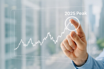Obraz premium A hand pointing at a graph with the words peak and the year twenty twenty five on a glass screen