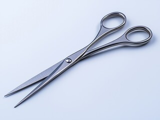 Silver scissors, elongated blades, on a white surface