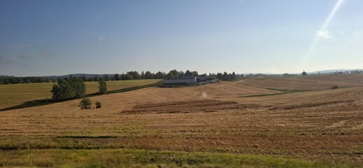 Norway Klofta Serene Countryside Landscape with Rolling Green Fields Beneath Clear Skies