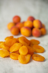 Apricot and dried apricot on a white background