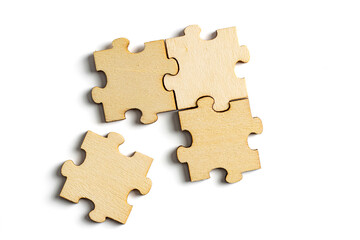 incomplete puzzle pieces, with seperated final pieces. Work and business concept with white background.